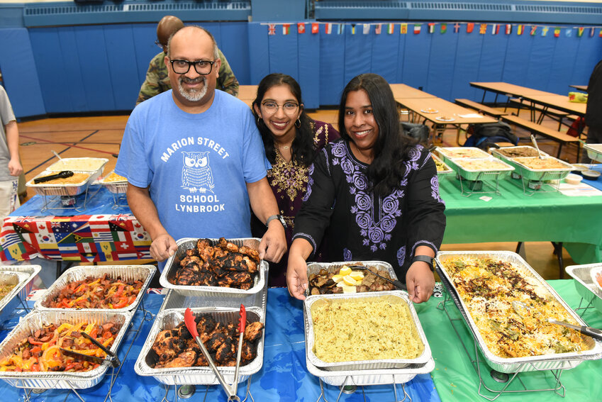 Mohamed Gaffoor, Lyla Gaffoor and Sharmin Hakim brought Indian and Bangladeshi dishes, khichuri and tandoori chicken.