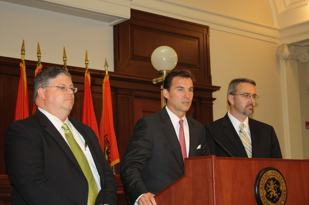 County Executive Tom Suozzi, center, is pledging no increase in property taxes in his 2010 proposed budget.