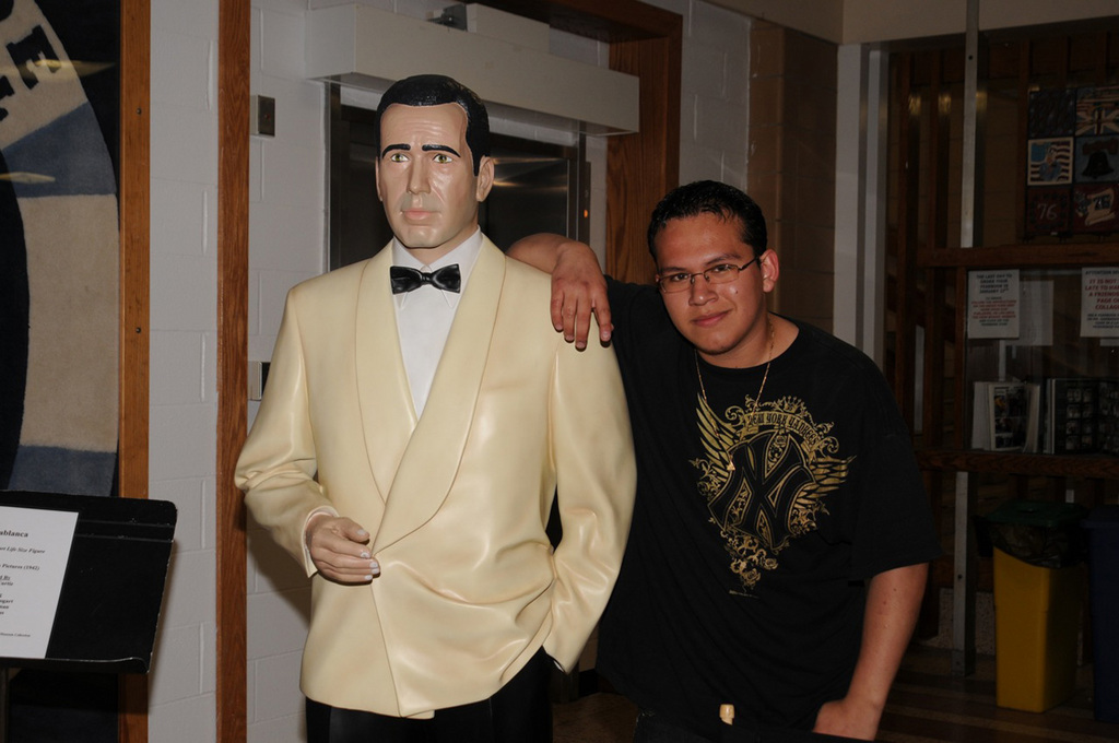 Oceanside student Oscar Romero poses with Humphrey Bogart.