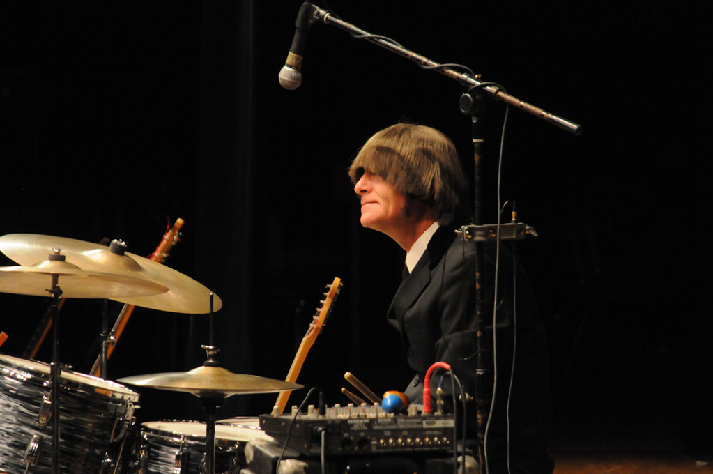 Ringo (Gerard Barberine Jr.) plays the drums during the fundraising 
concert.