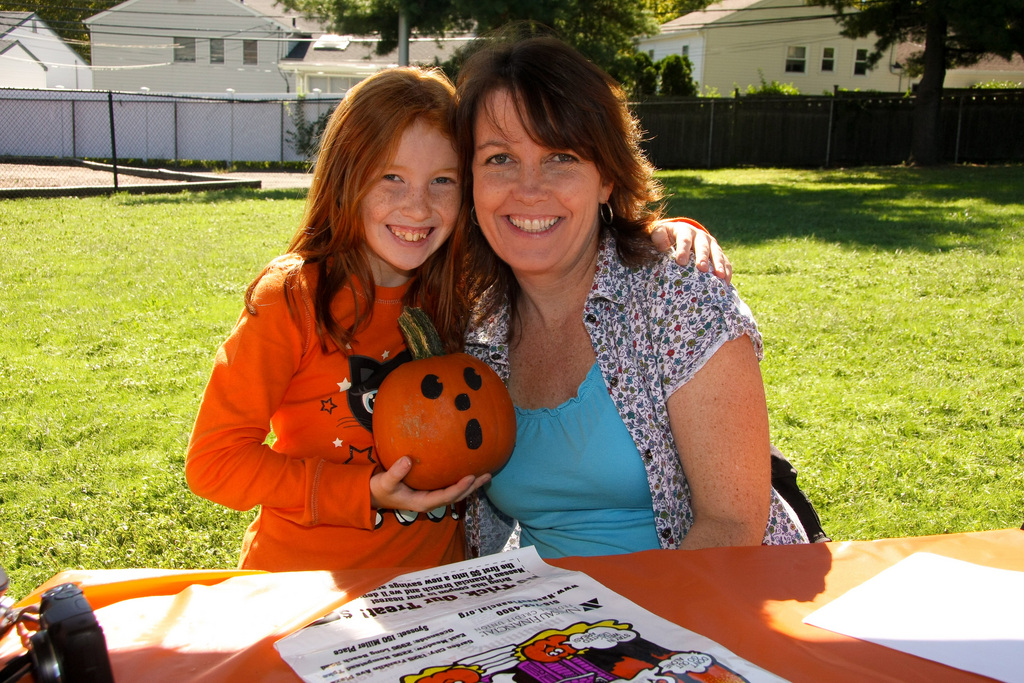 Elisabeth Carter, a fourth-grader and mom Eileen Carter, painted pumpkins together.