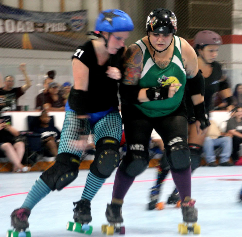 The club’s president, Lauren Madonia, a.k.a. “Captain Morgan,” right, is a Lynbrook resident and founding member of the L.I. Roller Rebels.