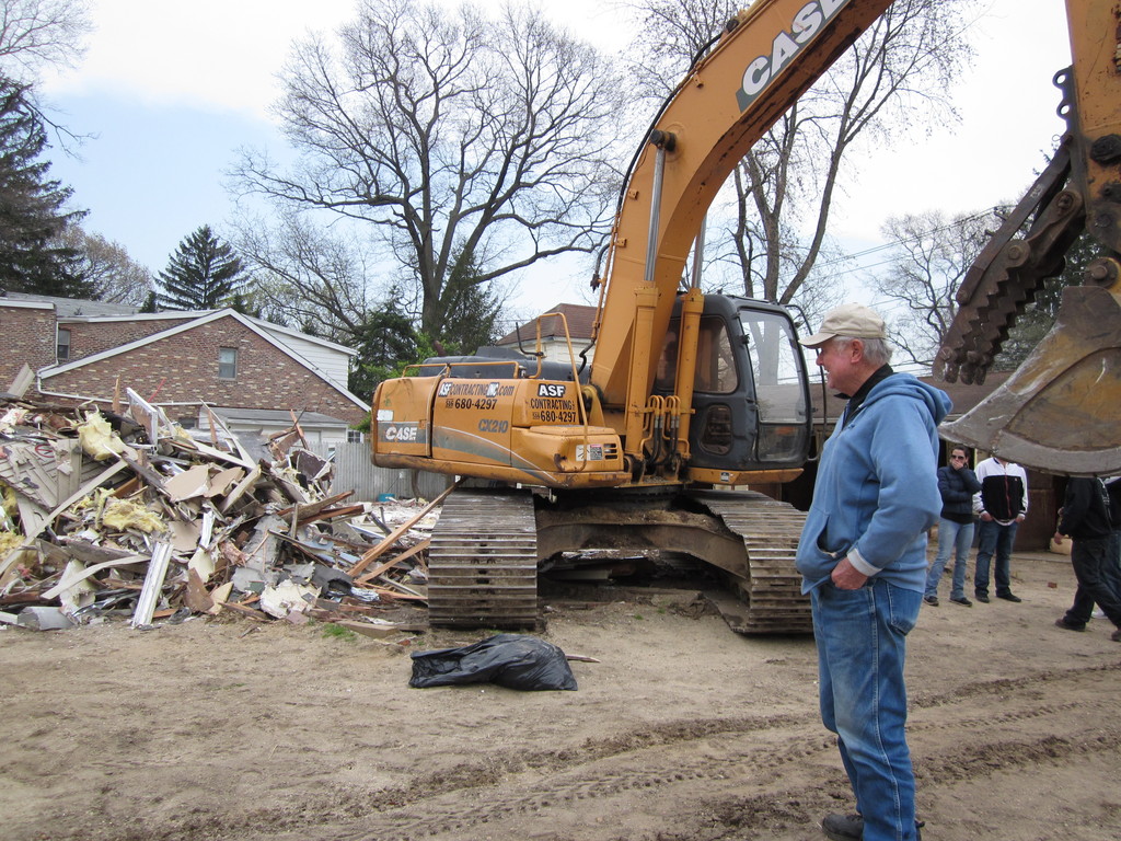 Bob Douglas, 74, examined the debris of what was once the clubhouse. He has been a regular at the facility for 52 years.