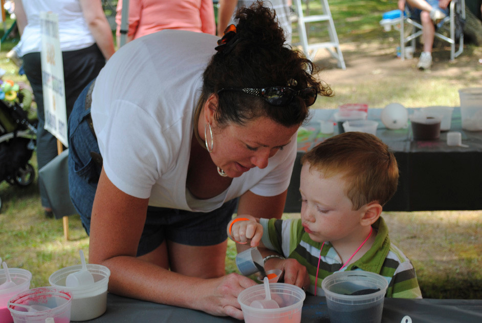 Sean Martin, 3, worked on his sand creation with the help of his mom, Kristen Martin.