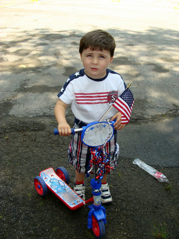 A red, white & blue boy after the baby parade.