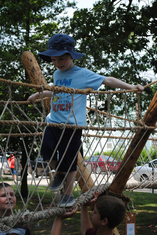 Nathan Healy, 4, made his way across the scout’s rope bridge.
