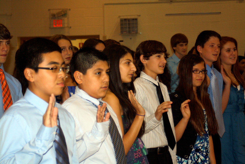 Students recited the honor society oath at the Lynbrook North Middle School’s National Junior Honor Society induction.