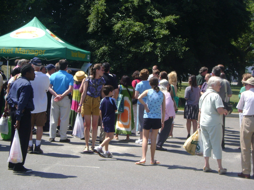 Nearly 100 people attended the Elmont Farmer's Market for its ribbon-cutting on June 30, at 11 a.m.