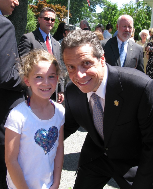 Emily O'Brien, 10, will long remember meeting Gov. Andrew Cuomo when he came to Central Avenue in Lynbrook to sign the tax cap law.