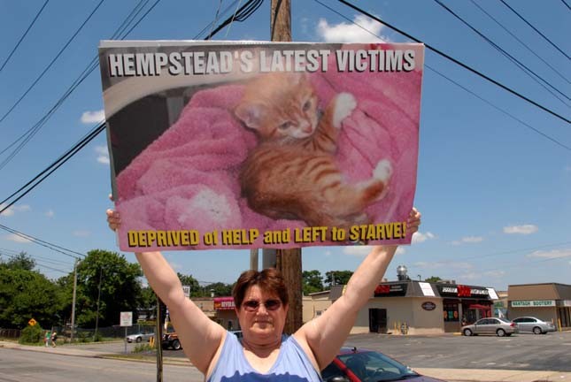 More than 40 local residents joined Hope for Hempstead, a local shelter-reform advocacy group, on June 30 to protest the Town of Hempstead Animal Shelter in Wantagh.