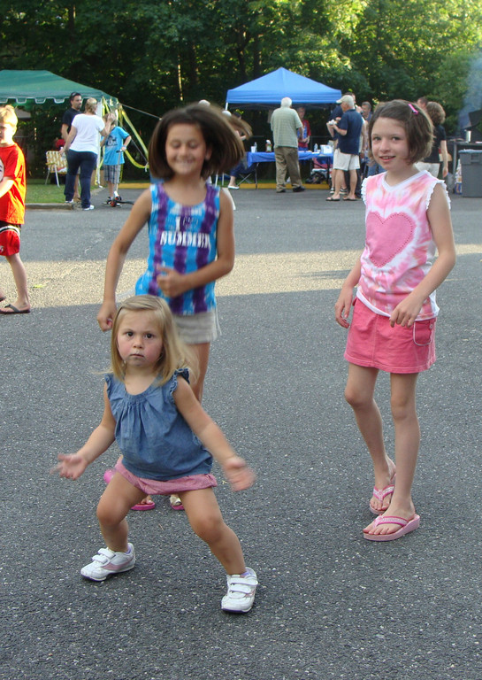 Three girls danced to the music provided by D.J. Doug.