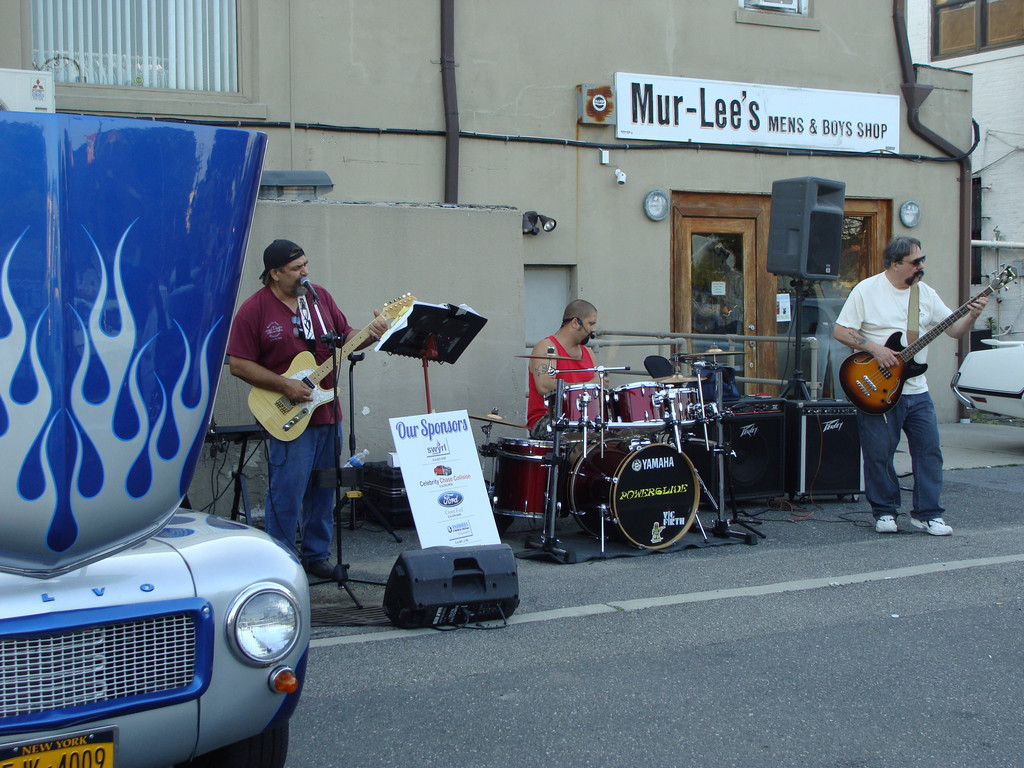 The band Powerglide entertained at the Lynbrook car show.