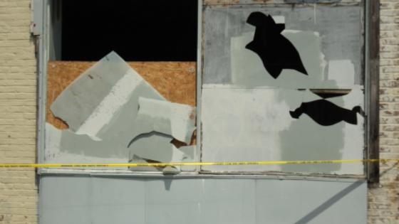 Windows were broken at a vacant Gibson Boulevard building on July 16.