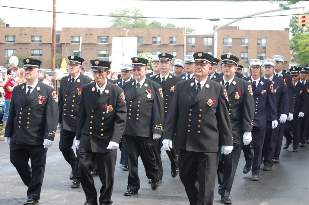 The Valley Stream Fire Department, shown marching the 2011 Memorial Day parade, will host a parade through the village on Aug. 6 to commemorate the 100th anniversary of Engine Company No. 1.