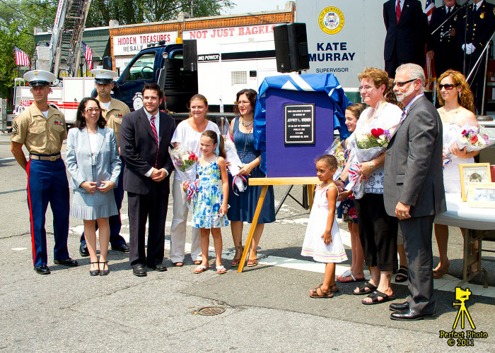 Wiener’s family, friends and public officials unveiled the commemorative plaque that will hang in the post office.
