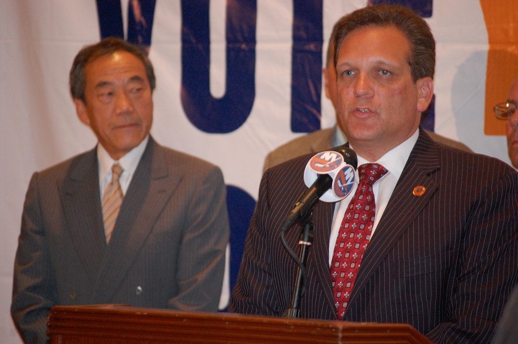 Islanders owner Charles Wang and County Executive Ed Mangano Monday night after the voters defeated the referendum.