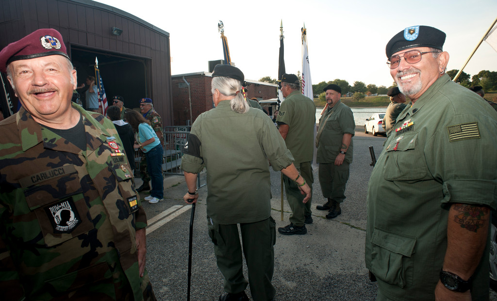 Elmont American Legion Post 1033 members Chuck Carlucci, a U.S. Army veteran, and Sal Martella, a Color Guard veteran, talked and prepared for the “Salute to Veterans” ceremony on Aug. 5, at the Harry Chapin Lakeside Theatre.