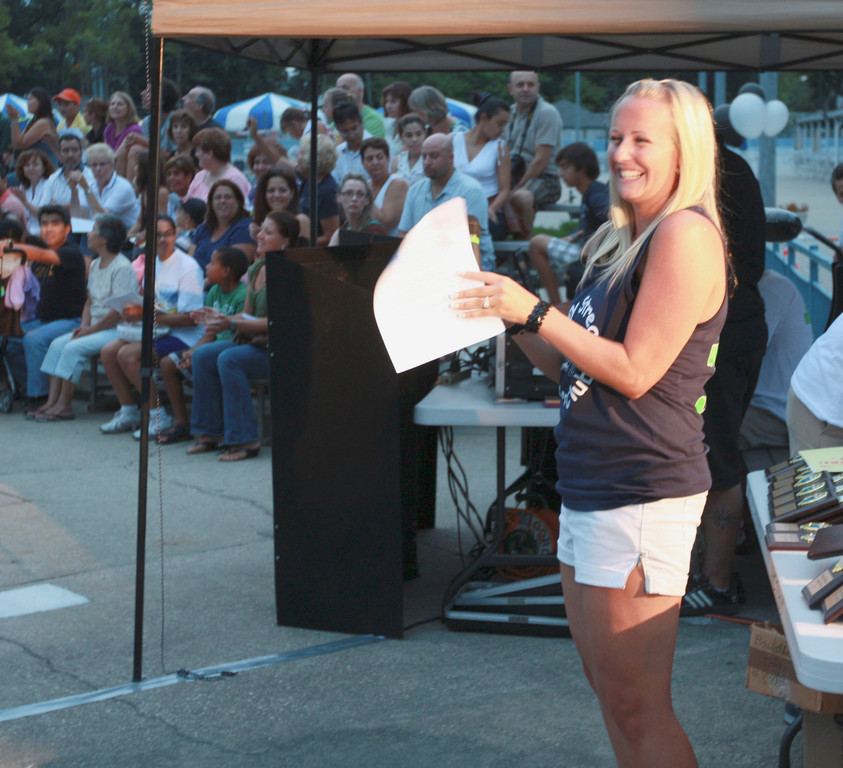 Aquatic Club Director Bridget Zinna announces the club’s awards.