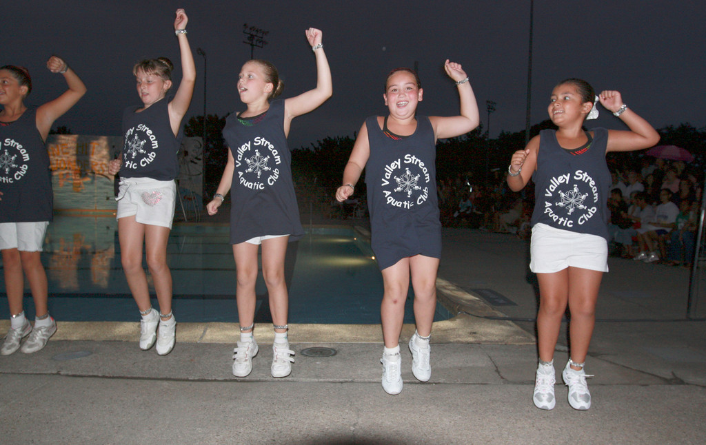 Younger Members of the Valley Stream Aquatic Club performed dance routines to fire up the crowd at the village’s annual pool show last Saturday evening at the Hendrickson Park pool complex.