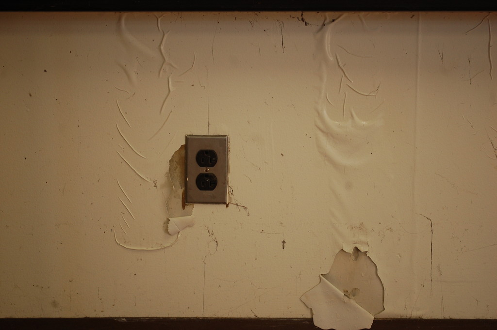 Damage to the walls inside of the Hendrickson Park administration building was visible after the water receded.