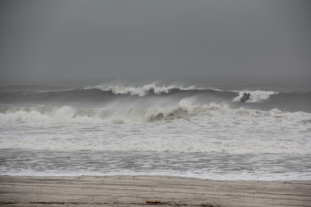 Surfers took advantage of Irene's wave swells.