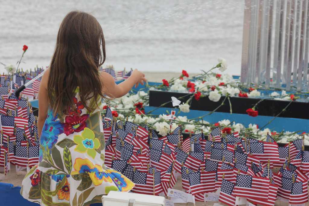 More than 2,000 friends and family members of the Long Islanders who died in the Sept. 11 attacks gathered on Sunday in Point Lookout for the Town of Hempstead's annual 9/11 Sunrise Memorial.