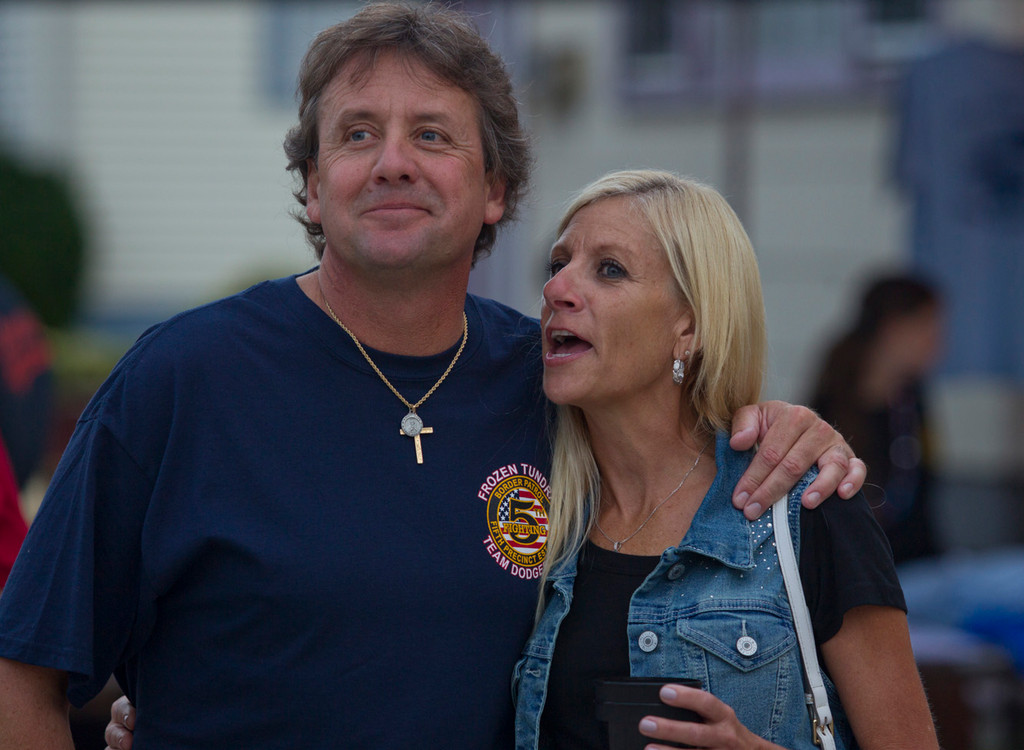 John Miller and Sharron McCarthy enjoy the band at the Lynbrook Fire Department’s Wounded Warrior Block Party