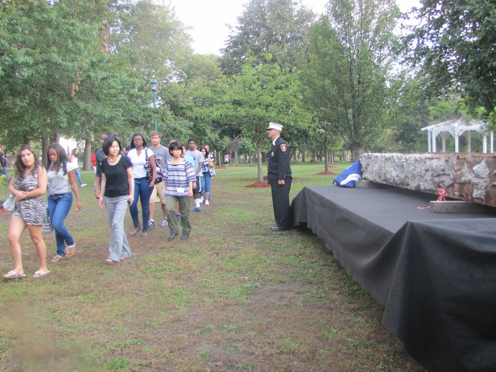 Central High School students walked by the steel beam recovered from the World Trade Center at Hendrickson Park on Monday.