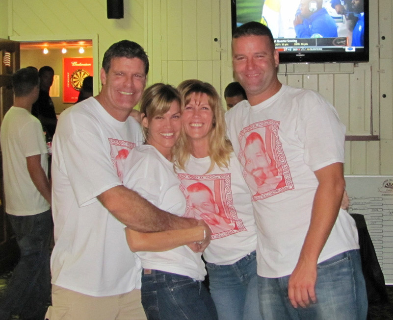 Timothy’s siblings, from left Denis, Kelly, Kathryn, and Michael welcomed the many guests to the third annual Timothy Motherway Memorial Scholarship Dart Tournament.
