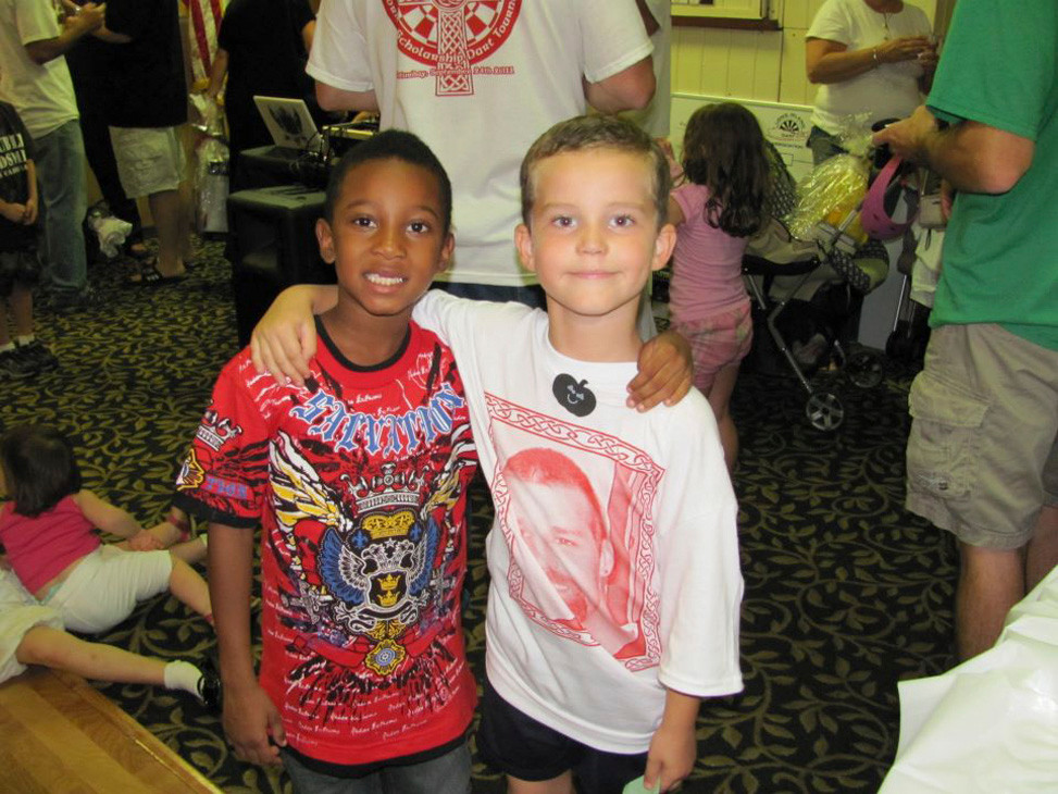 Family friend Jayden Johnson 8, left, and Timothy Motherway’s Godson Joseph Jakits, 5 hung around together at the event.