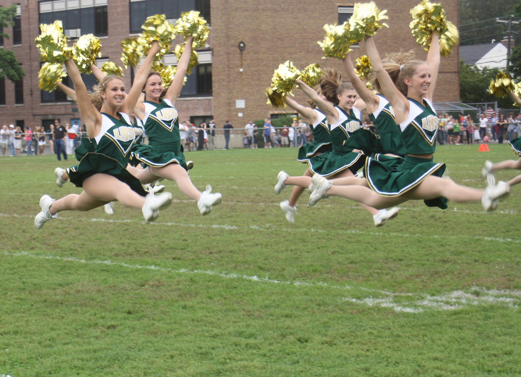 Members of the Lynbrook varsity cheerleading squad wowed the crowd with their acrobatic talent and spirit at the Owls homecoming game recently. Story, more photos, page 6.