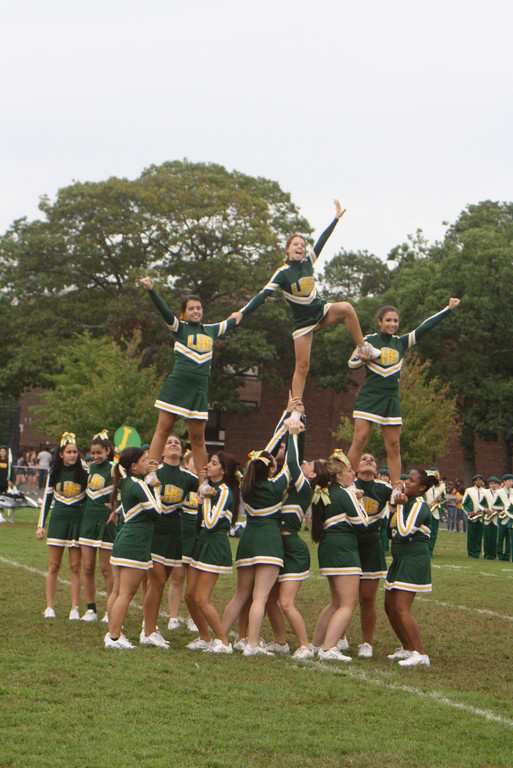 The Lynbrook Varsity Kickline team performed a high-stepping precision routine in the halftime show.
