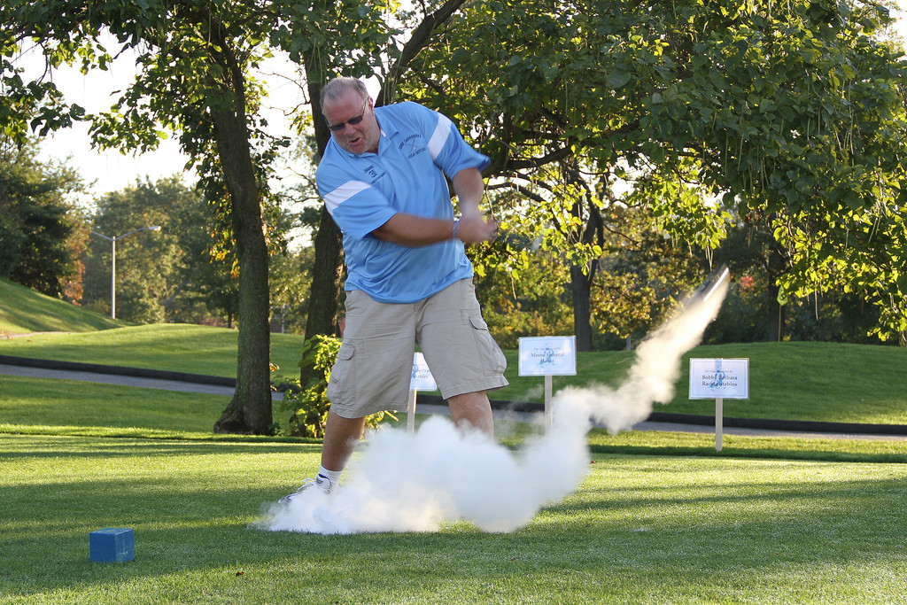 John LaBarbera hits an exploding golf ball, a practical joke.