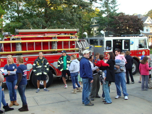 Firefighters answers questions from residents of all ages!