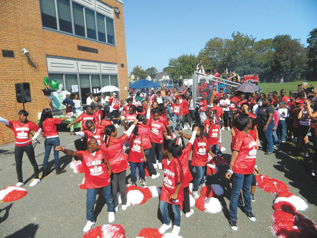 Elmont Cardinals cheerleaders entertained Family Day attendees last weekend with “rocksteady” and hip-hop cheers.