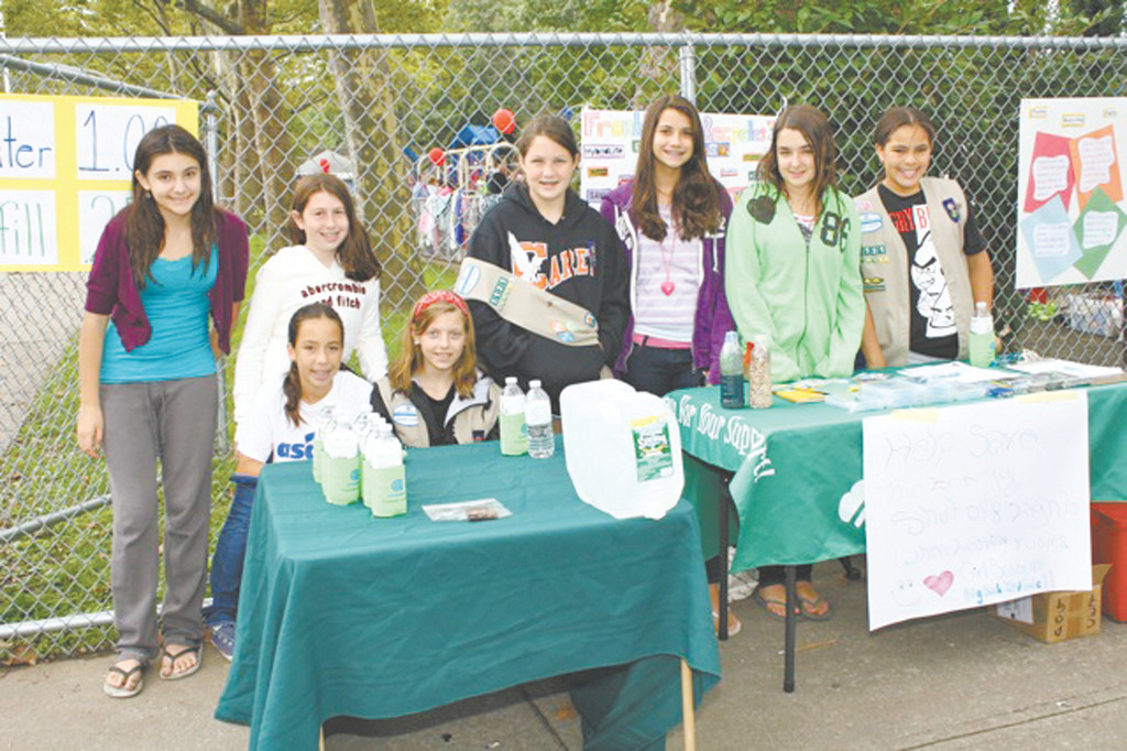 Isabella Sperazza, 12, from left, back row, Emily Nelson, 12, Gabi Vasilakis, 12, Allison Freese, 12, Claire Curtin, 11, Haley Brogna, 12, Whitney Phair, 12, and Rose DioLallevi, 12, of local Troop 1131 hosted the third annual Big Backyard Sale, and are working toward their Silver Award.
