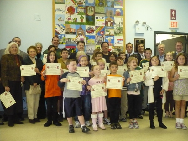 Dozens of children in the Recreation Department’s summer art program painted canvases in celebration of the village’s centennial. They were given certificates for their efforts.