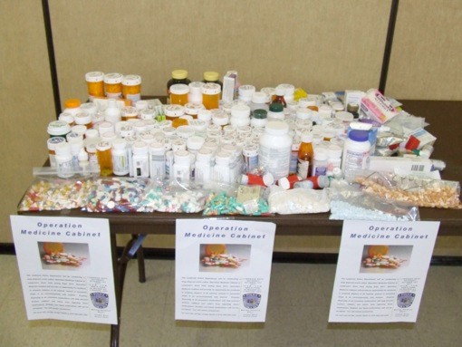A table  of unwanted drugs collected during the “Operation Medicine Cabinet” event held at Lynbrook’s Greis Park on October 1.