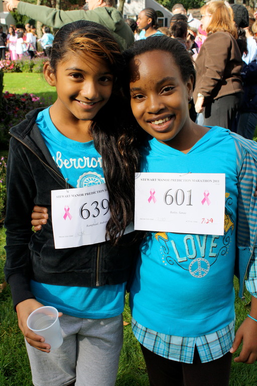 Andrea Ramphaul, 11, left, and Sanaa Bailey, 10, were all smiles after the Prediction Marathon on Oct. 21.