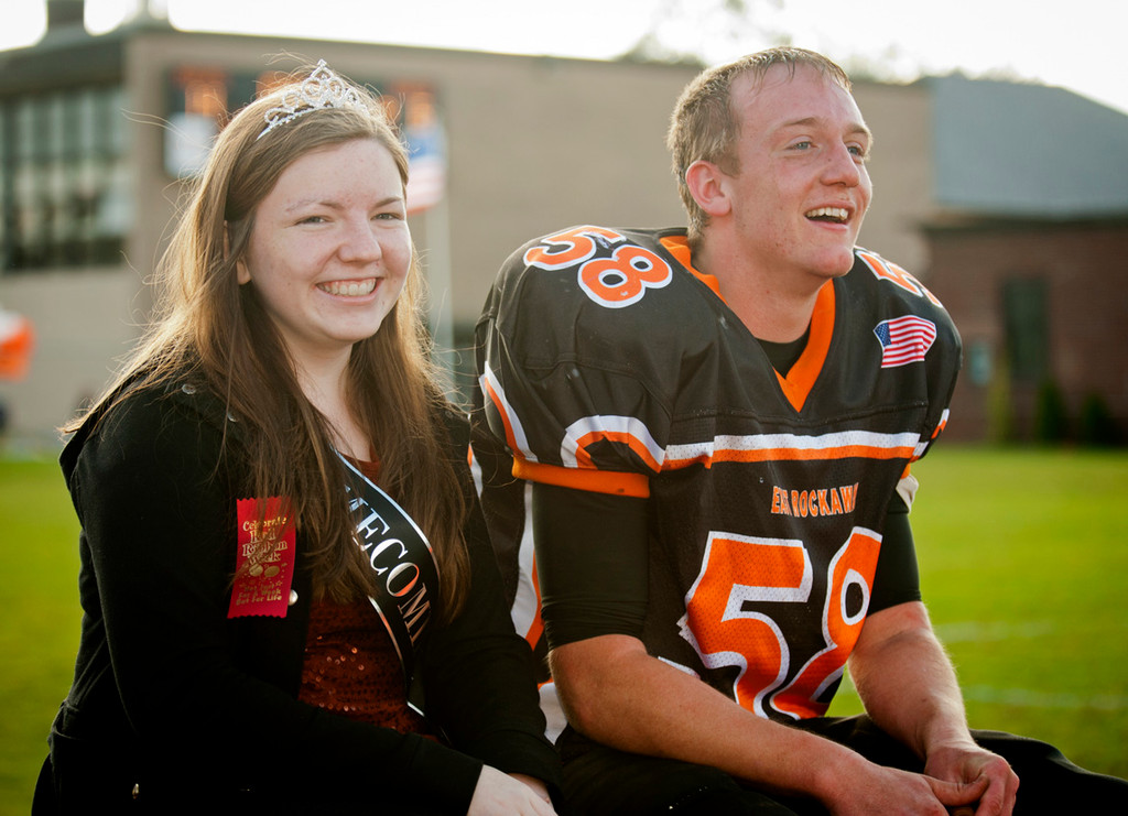 Rocks Homecoming Queen and King Emily McLauglin and Josh Warner rode the field during the ceremonies.