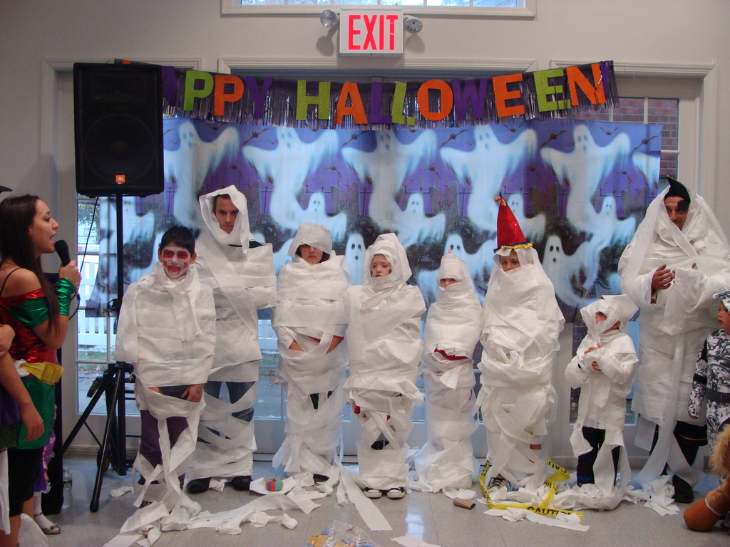 Where’s my mummy? Children (and adults) participated in the Mummy Relay Race at the Senior Center in East Rockaway.