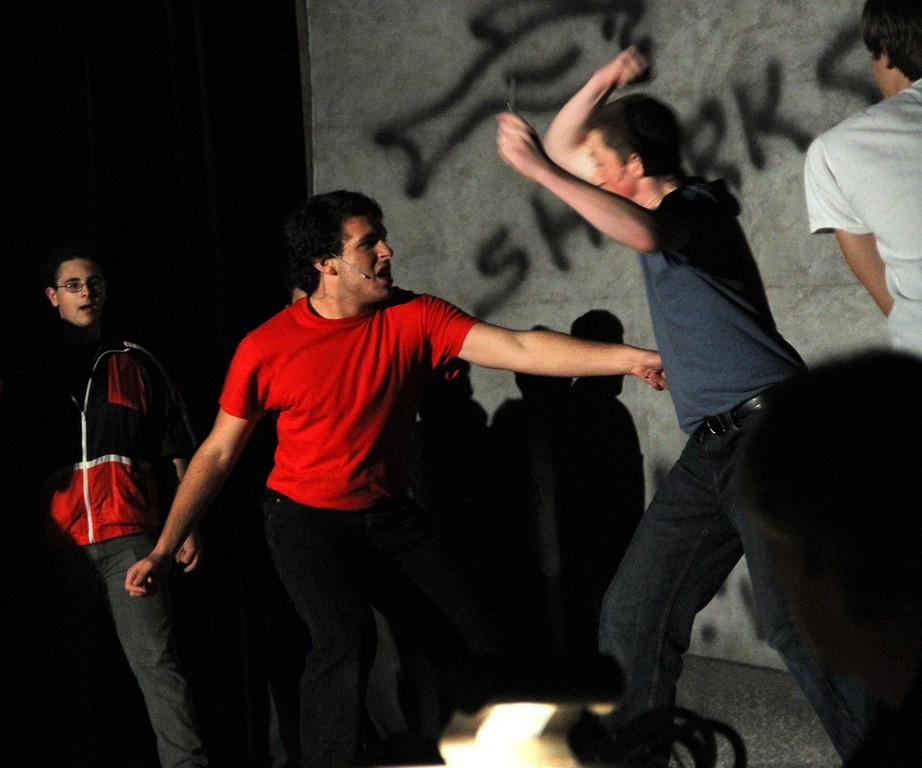 Bernard (Zach Zaromatidis) and Riff (Teddy Sieban) get into a knife fight.