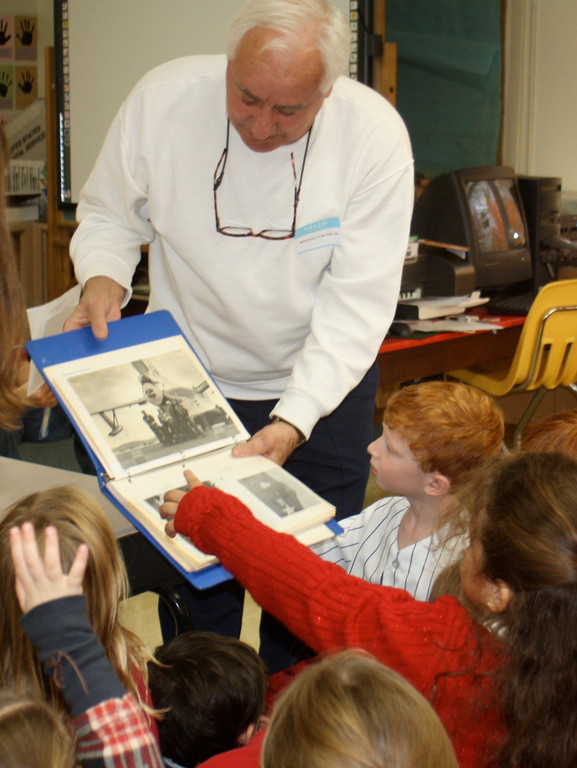 Michael Russo shared his Navy photos with first graders.