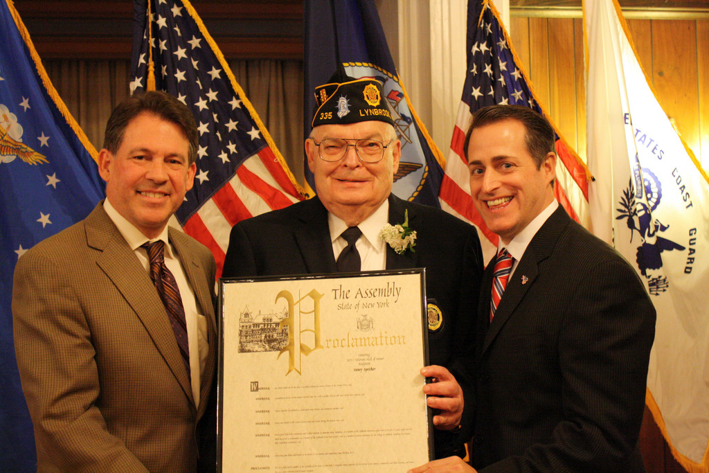 Henry Speicher has been a member of the Lynbrook American Legion Post 335 for 25 years and has served as its commander for eight years. He is also a member of the Lynbrook VFW post 2307. His pictured with Curran, right, and Leg. Francis X. Becker, left.