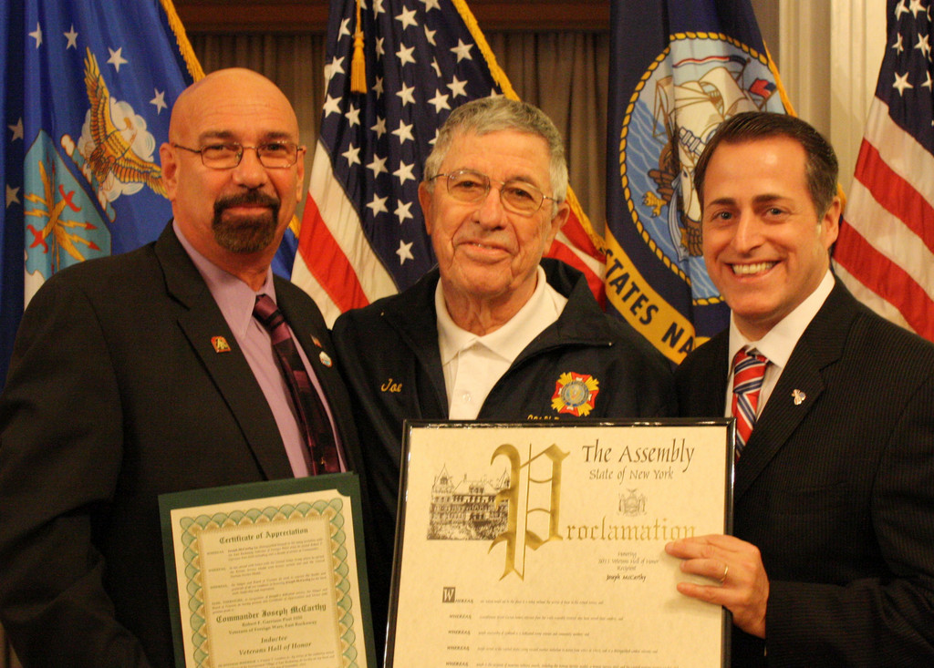 VFW Commander of the Robert F. Garrison Post 3350 Joe McCarthy, center, accepted his award from Assemblyman Curran, left, and East Rockaway Mayor Francis T. Lenahan.