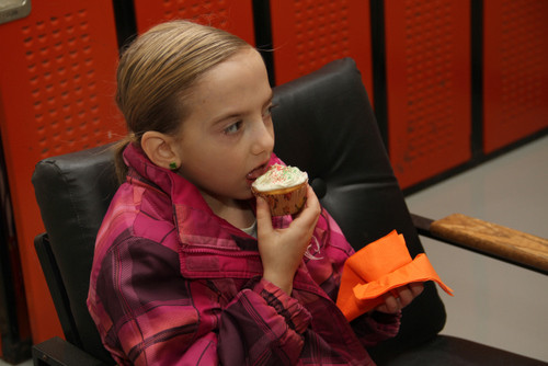 Michelle Langbart partakes in a celebratory cupcake.