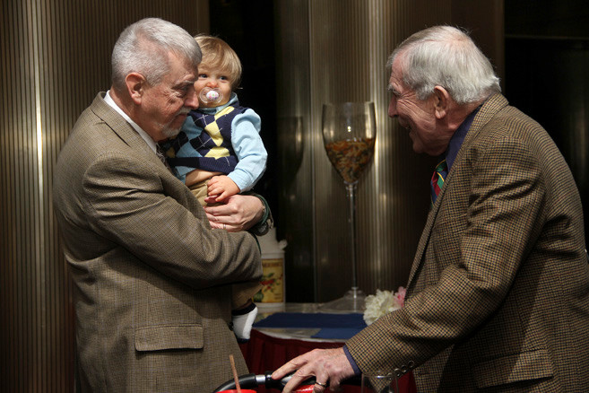 Award recipient Richard Meagher, left, and John Beyrer with their mutual grandson, Quinn Richard Beyrer.