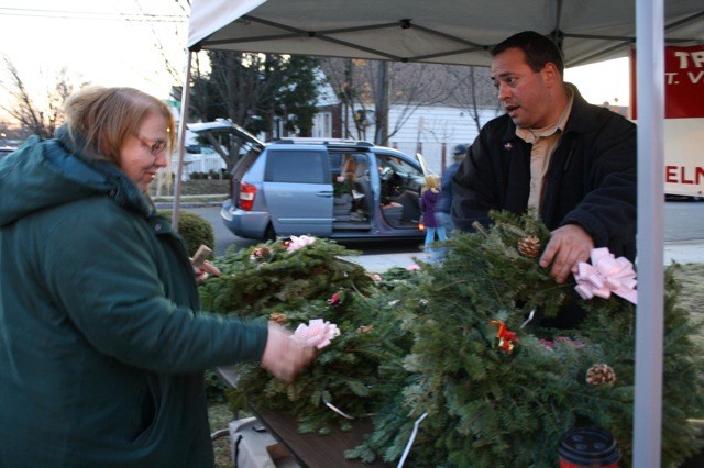 Dottie Goldblum of Elmont, left, bought a few nice wreaths and helped support the
Boy Scouts of Troop 294.