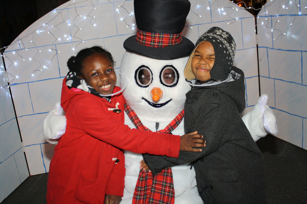 Shania, 9, and Isaiah Durandisse, 7, of Lynbrook, gave a great, big warm bug to Frosty The Snowman.