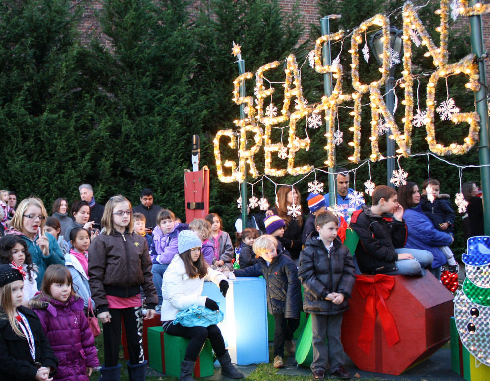 The large crowd waited to see the village’s Christmas tree light up!